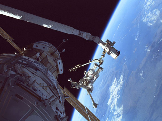 STS-96 astronaut Tamara E. Jernigan handles a crane