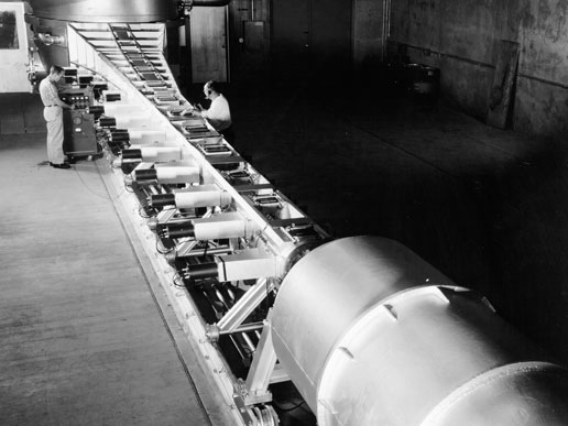 Technicians work on the Atmospheric Entry Simulator.