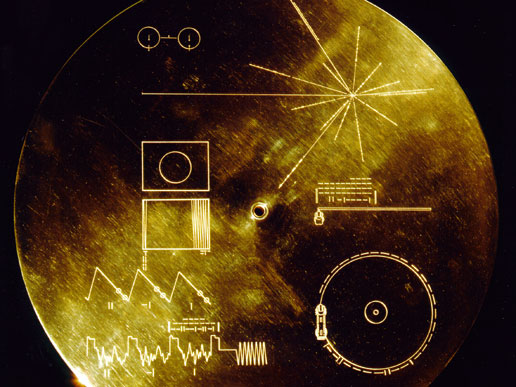 Gold aluminum cover designed to protect the Voyager 1 and 2 Sounds of Earth gold-plated records from micrometeorite bombardment Gold aluminum cover designed to protect the Voyager 1 and 2 Sounds of Earth gold-plated records from micrometeorite bombardment